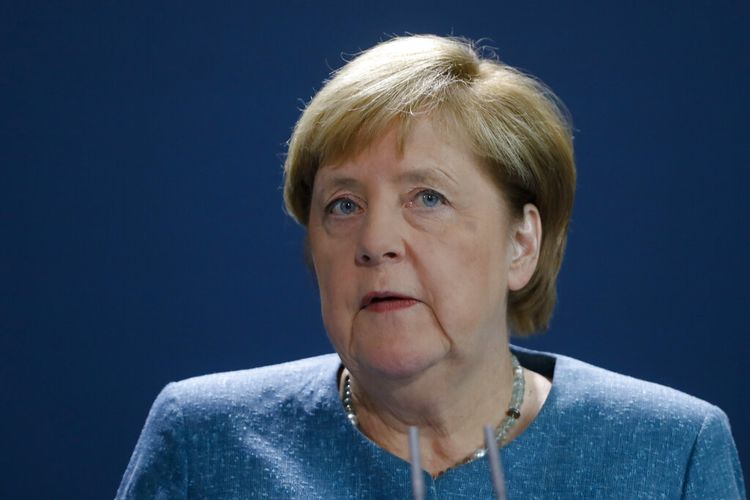 German Chancellor Angela Merkel speaks to media during a statement about latest developments in the case of Russian opposition leader Alexei Navalny at the chancellery in Berlin, Germany, Wednesday, Sept. 2, 2020. Russian opposition leader Alexei Navalny was the victim of an attack and poisoned with the Soviet-era nerve agent Novichok, the German government said Wednesday, Sept. 2, 2020 citing new test results. (AP Photo/Markus Schreiber, Pool)