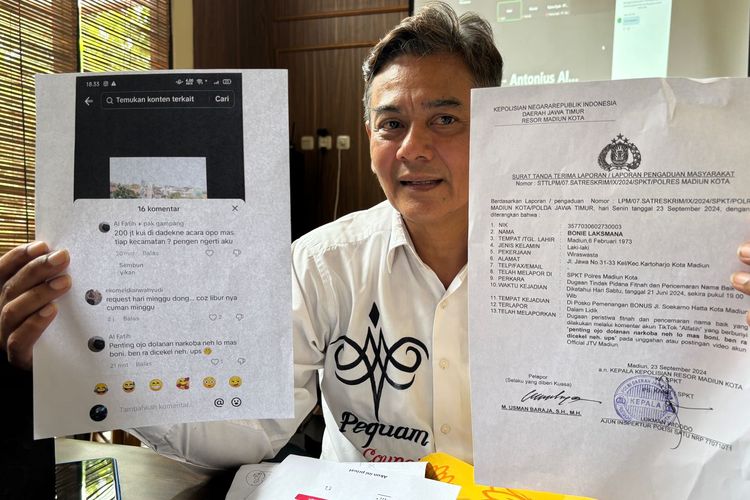 Tim Kuasa Hukum paslon Bonus (Bonie Laksmana-Bagus Rizki) menunjukkan laporan polisi terkait pencemaran nama baik terhadap Bonie di media sosial. Tim melaporkan pemilik akun TikTok ke Polres Madiun Kota.