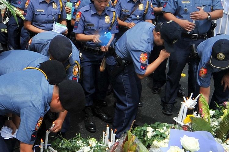 Penyanderaan di Filipina tahun 2010, delapan orang warga negara asal Hong Kong tewas. AFP PHOTO/TED ALJIBE 