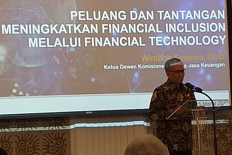 Ketua Dewan Komisioner OJK Wimboh Santoso saat menjadi pembicara di acara meningkatkan inklusi keuangan dengan fintech di Jakarta, Selasa (5/2/2019).