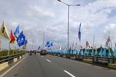 Warna-warni Bendera Parpol di Flyover Pondok Kopi, Berkibar dari Ujung ke Ujung
