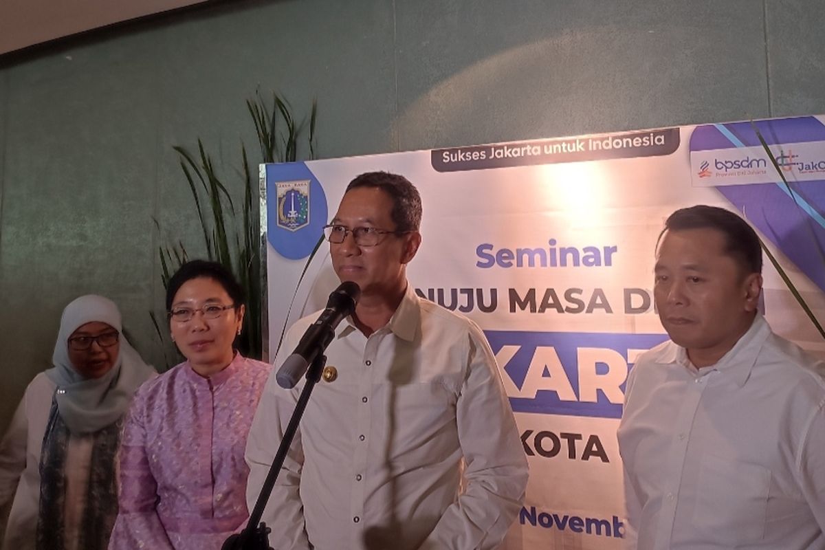 Penjabat Gubernur DKI Jakarta Heru Budi Hartono saat menghadiri seminar dengan tema Menuju Masa Depan Jakarta Sebagai Kota Global di Taman Ismail Marzuki, Jakarta Pusat pada Selasa (28/11/2023).