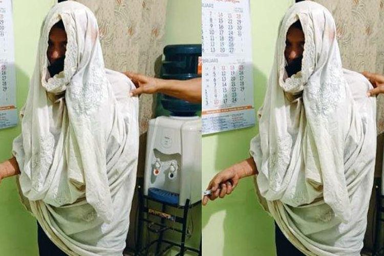 
Tersangka Suyono, kakek asal Kabupaten Ponorogo yang kenakan mukena saat mencuri. 