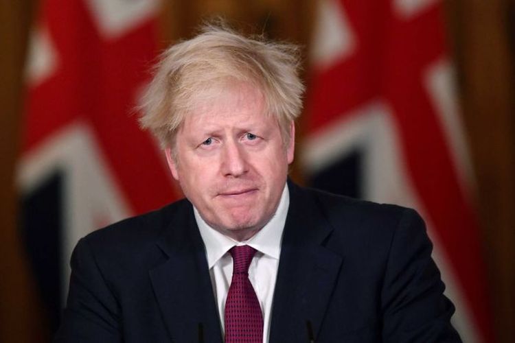 Perdana Menteri Inggris akan memimpin rapat darurat hari Senin guna mengkoordinir langkah penanggulangan Covid-19 karena adanya varian baru. (AP: Toby Melville)