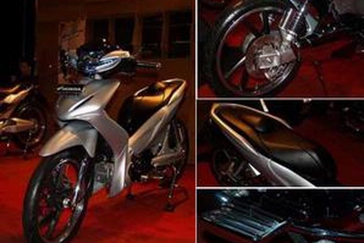 Honda Absolute Revo Luxury VIP. Suspensi tetap model dua, tapi lebih miring. Sadel dikasih punuk agar yang dibonceng tidak merosot. Pedal kaki yang lebar