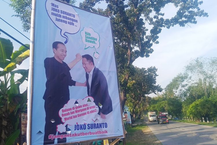 Baliho Jokowi Restui Crazy Rich Grobogan, Joko Suranto pimpin Jateng terpajang di Kecamatan Geyer, Kabupaten Grobogan, Jateng, Minggu (2/6/2024).