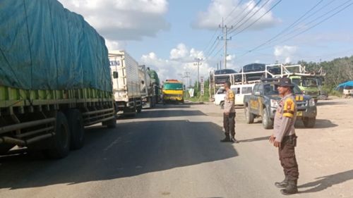 Sosialisasi Pemilu Saat Kemacetan 10 Km akibat Banjir Lintas Sumatera