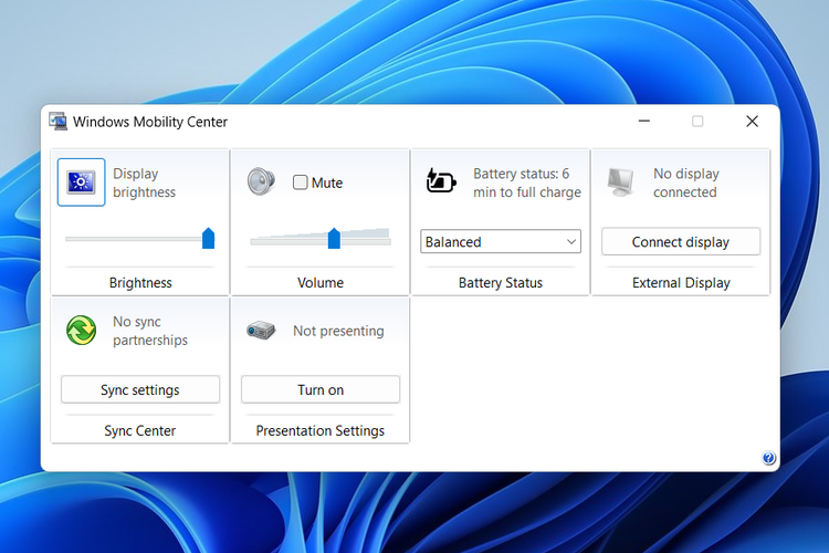 Ilustrasi cara mengurangi cahaya komputer Windows 11 lewat Mobility Center.