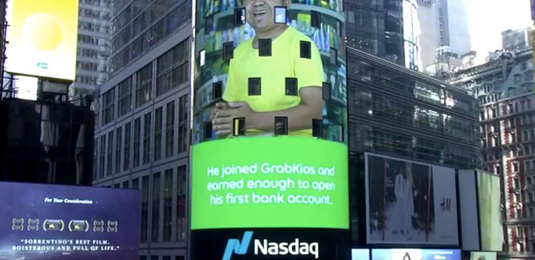 Cahyo Widodo, mitra GrabKios yang juga penyandang disabilitas, tampil di menara NASDAQ, New York, Amerika Serikat 