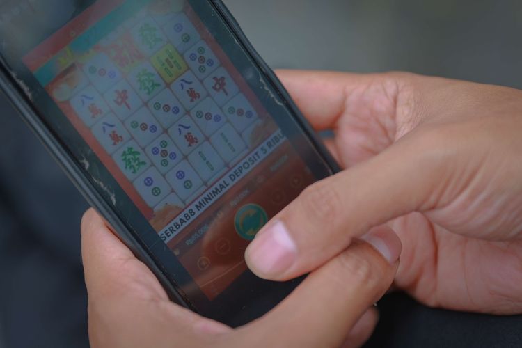 Viral Video Pemuda Kabur Usai Top Up E-Money Malang, Tenyata untuk Judi Online