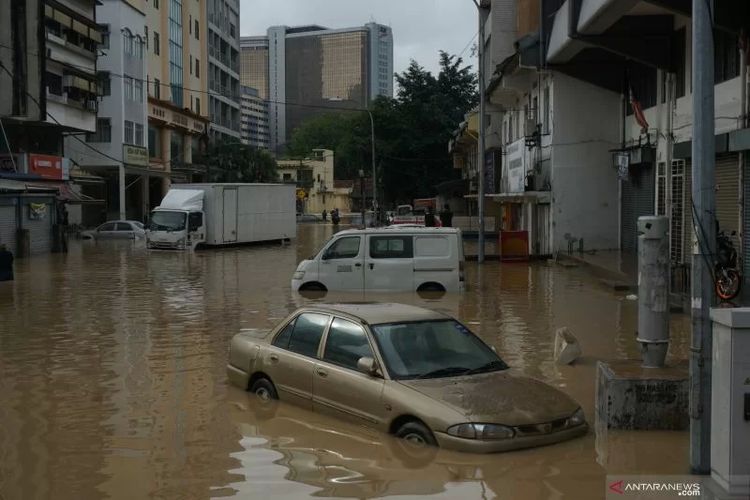 (FILE) An undated image of submerged cars in flood in Kuala Lumpur, Malaysia. 