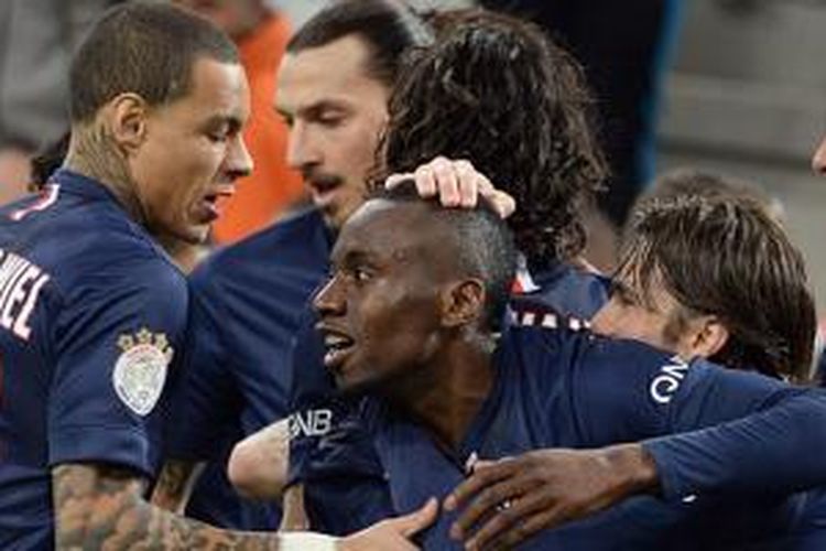 Para pemain PSG merayakan kemenangan atas Marseille pada laga bertajuk Le Classique, Minggu (5/4/2015). 