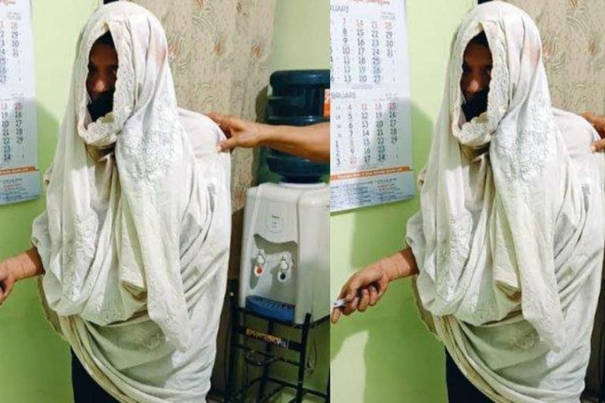 
Tersangka Suyono, kakek asal Kabupaten Ponorogo yang kenakan mukena saat mencuri. 