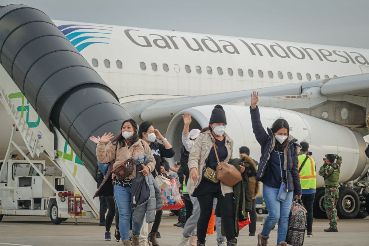 Eighty Indonesians and three foreign family members evacuated from Ukraine arrived in the Soekarno-Hatta International Airport near Jakarta Thursday, March 3, 2022.  They departed Bucharest in Romania by the national flag carrier Garuda Indonesia flight GA7730.   