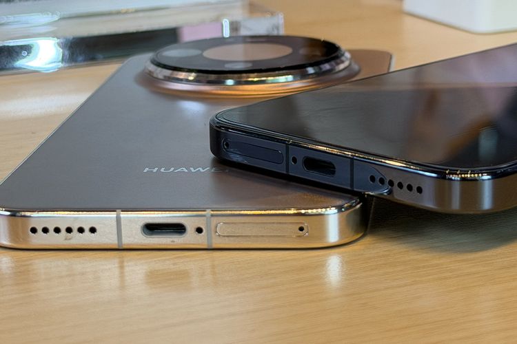 Bagian bodi bawah Mate 80 Pro terdapat slot untuk menyimpan kartu SIM, port USB-C untuk pengisian daya atau transfer data, serta speaker