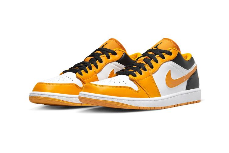 Air Jordan 1 low dengan colorway Taxi. 