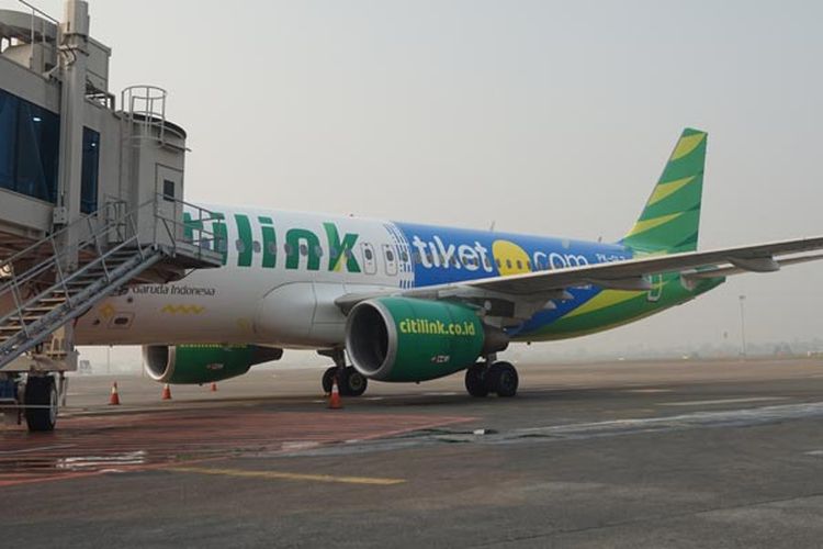 Pesawat Citilink dengan logo tiket.com di Bandara Soekarno-Hatta, Jumat (27/7/2018).  