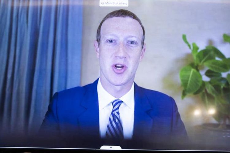 Facebook CEO Mark Zuckerberg, here giving testimony to the US Senate, has come under increased scrutiny over his site's role in the spread of false information