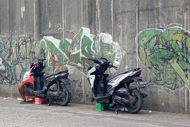 Pengerjaan suspensi motor