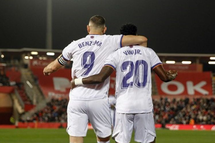 Selebrasi Karim Benzema dan Vinicius Junior dalam laga Real Mallorca vs Real Madrid pada pekan ke-28 LaLiga.