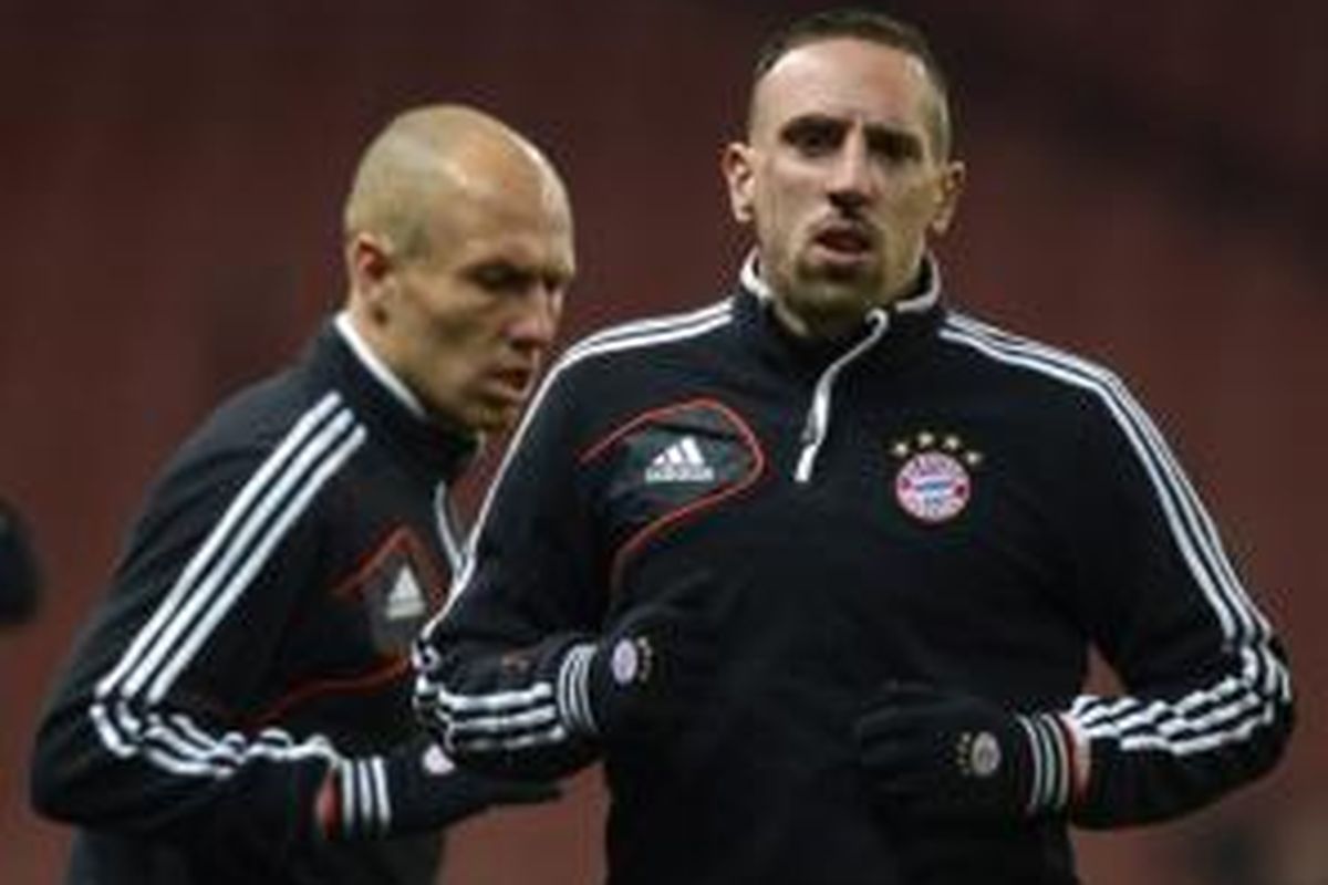 Dua pemain Bayern Muenchen, Arjen Robben (kiri) dan Franck Ribery (kanan).