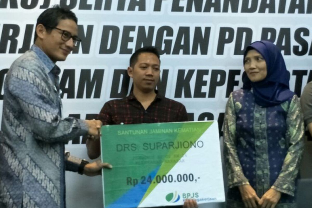 Wakil Gubernur DKI Jakarta Sandiaga Uno saat menghadiri pelantikan Panitia Pembina Keselamatan dan Kesehatan Kerja di Pasar Induk Kramat Jati, Jakarta Timur, Kamis (1/3/2018). 