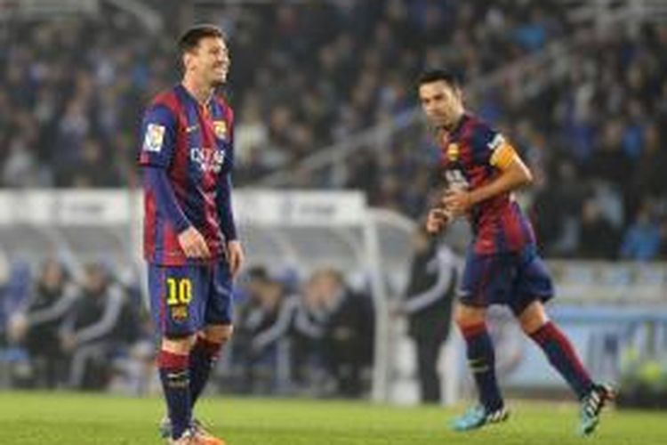 Salah satu ekspresi penyerang Barcelona Lionel Messi, ketika tampil pada pertandingan Primera Division melawan Real Sociedad, di Anoeta, San Sebastian, Minggu (5/1/2015).