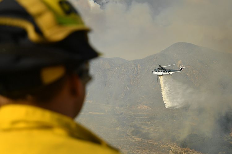 Raging forest fires in Marseille triggered mass evacuations for around 2,700 people on Wednesday, officials said.