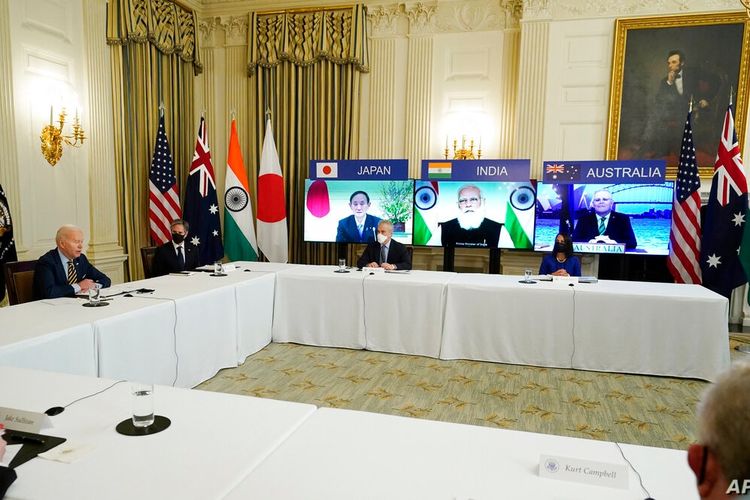 President Joe Biden speaks during a virtual meeting with Indian Prime Minister Narendra Modi, Australian Prime Minister Scott Morrison and Japanese Prime Minister Yoshihide Suga, from the State Dining Room of the White House, March 12, 2021.
