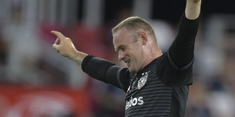 Striker DC United, Wayne Rooney, saat merayakan salah satu gol timnya menghadapi Vancouver Whitecaps FC dalam laga Major League Soccer 2018 di Stadion Audi Field , Washington DC, Amerika Serikat, pada 14 Juli 2018.