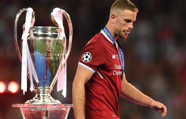 Kapten Liverpool, Jordan Henderson melewati piala Liga Champions seusai timnya kalah 1-3 dari Real Madrid di partai final, Sabtu (26/5/2018). Liverpool vs PSG akan menjadi langkah awal Henderson di Liga Champion musim ini. 