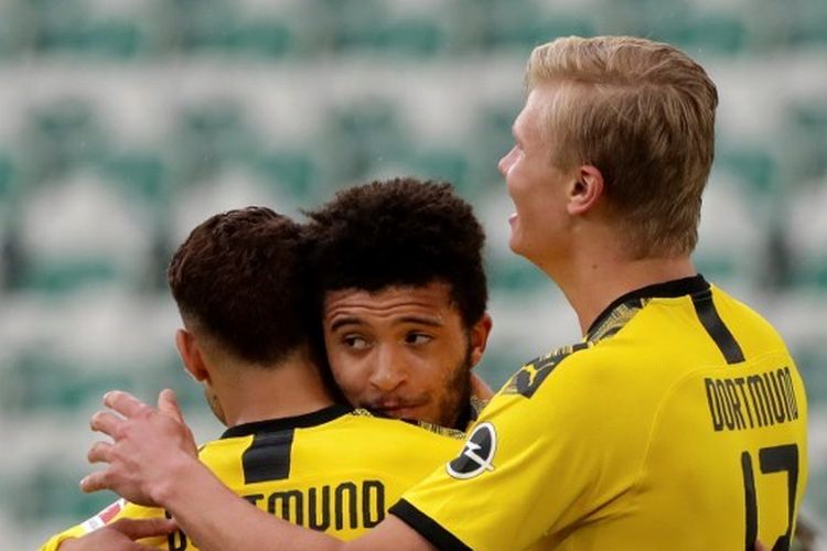 Achraf Hakimi, Jadon Sancho dan Erling Braut Haaland saat merayakan gol kedua Borussia Dortmund dalam laga kontra Wolfsburg, Sabtu (23/5/2020) malam WIB