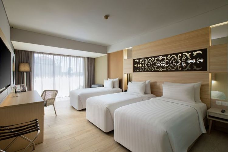 (Kamar triple room dilengkapi single bed dan amenities untuk tiga orang. 