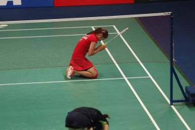 Pebulu tangkis tunggal putri Thailand, Ratchanok Intanon, merayakan kemenangan atas Yui Hashimoto (Jepang) pada laga final BCA Indonesia Open Superseries Premier 2015 di Istora Senayan, Jakarta, Minggu (7/6/2015).