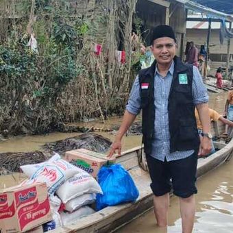 Satu jalur utama menghubungkan Kecamatan Langkahan dan Kecamatan Pante Bidari, Kabupaten Aceh Timur masih terendam banjir hingga Kamis (18/12/2025).