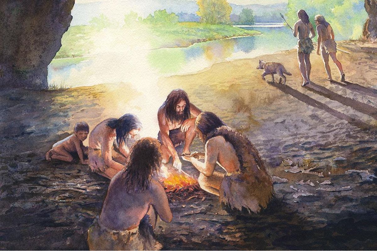 Ilustrasi manusia purba Neanderthal yang membuat api dengan menggesekkan batu.