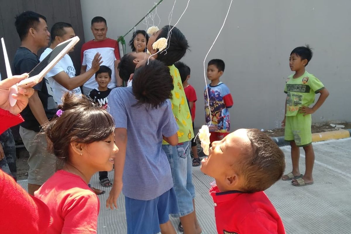 Ekspresi anak-anak saat mengikuti lomba HUT ke-74 RI di perumahan di kawasan Baleendah, Kabupaten Bandung, Sabtu (17/8/2019).