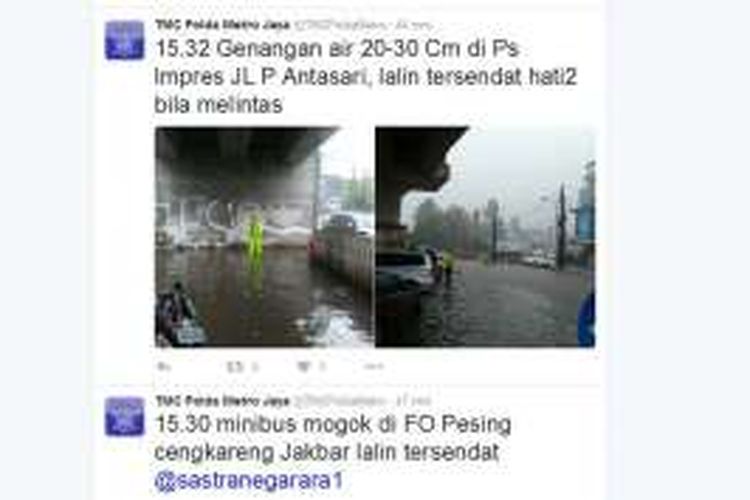 Genangan air yang tampak di sejumlah lokasi di Jakarta mengakibatkan arus lalu lintas tersendat. 
