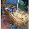 Molunggelo, Tradisi Mengayun Bayi yang Baru Lahir di Gorontalo