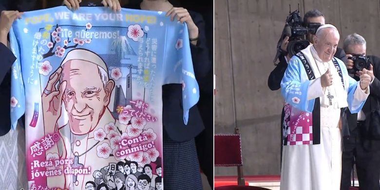 Paus Fransiskus mengenakan happi (jubah tradisional) bergambar anime wajahnya ketika berkunjung ke Katedral Holy Mary di Tokyo, pada 25 November 2019.