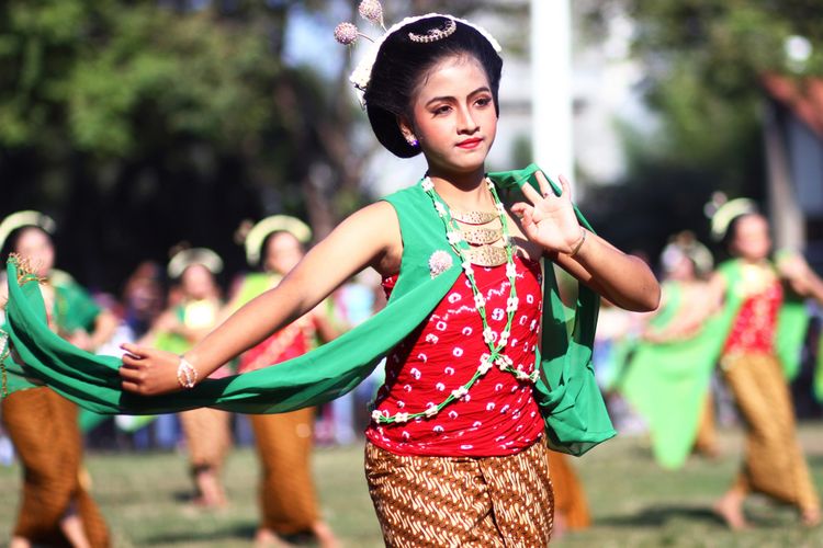 The dancer performed the Gambyong dance in Klaten Square, Central Java, July 6, 2019. Dancer studios participated in the dance parade to commemorate 215th anniversary of the city of Klaten, in addi