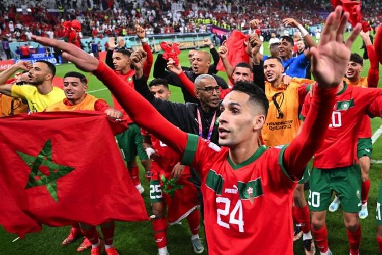 Timnas Maroko merayakan kemenangan mereka atas Portugal di babak perempat final Piala Dunia 2022.