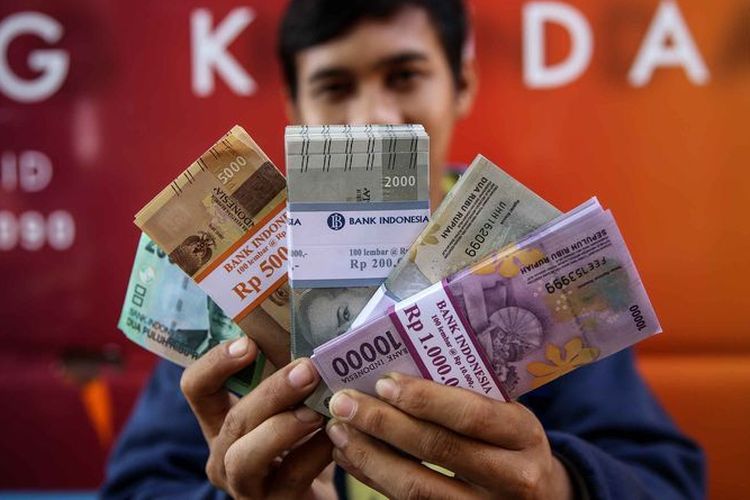 Ilustrasi penukaran uang baru. Cek lokasi penukaran uang baru di kas keliling dan titik perbankan di wilayah Denpasar selama bulan Ramadhan 2024.
