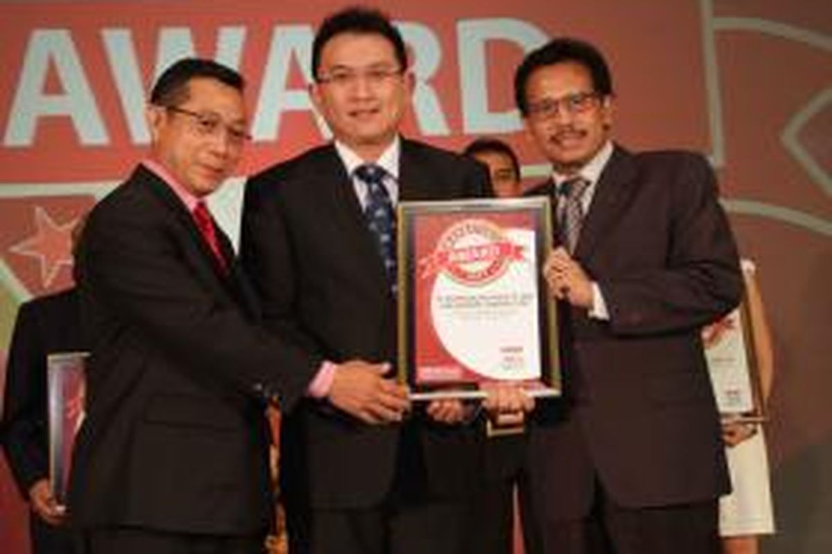 Andy K Natanael, Direktur PT Modernland Realty Tbk, meraih penghargaan untuk kategori 'The Best Marketing Campaign', Jumat (11/9/2015).  