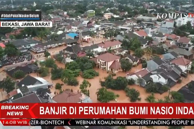 Tangkapan layar Kompas TV terkait suasana banjir di Perumahan Nasio Indah, Bekasi, Sabtu (20/2/2021).