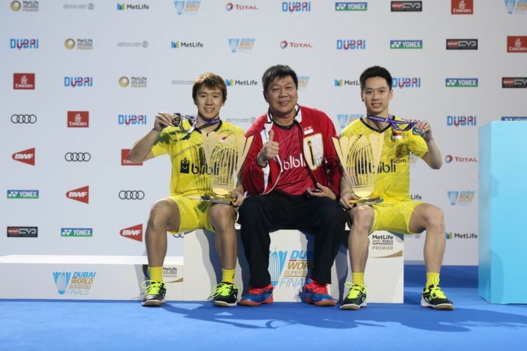 Marcus Fernaldi Gideon/Kevin Sanjaya Sukamulyo dam pelatih Aryono Miranat