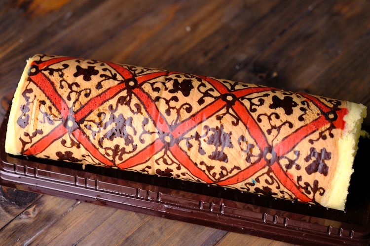 Ilustrasi bolu gulung motif batik.