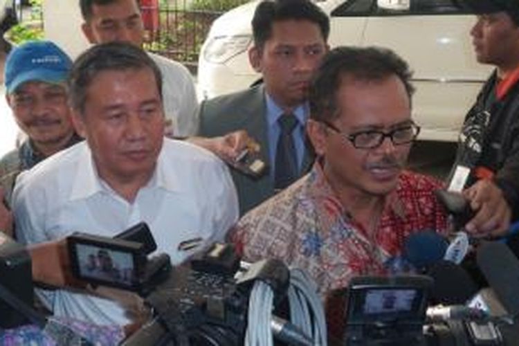 Dua komisioner Komisi Yudisial, Suparman Marzuki dan Taufiqurrahman Syahuri memenuhi panggilan pemeriksaan sebagai tersangka kasus dugaan pencemaran nama baik.