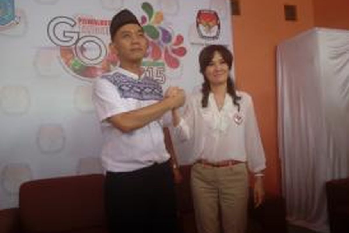 Ikhsan Modjo dan Li Claudia Chandra mendaftarkan diri sebagai calon wali kota dan wakil wali kota Tangerang Selatan di kantor KPU Tangsel, Senin (27/7/2015).