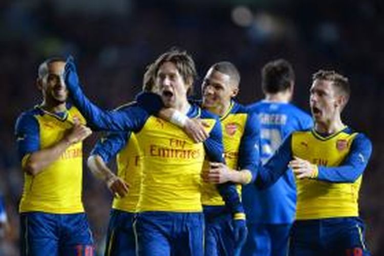 Ekspresi gelandang Arsenal, Tomas Rosicky, seusai mencetak gol ke gawang Brighton & Hove Albion pada putaran keempat Piala FA, Minggu (26/1/2015). 